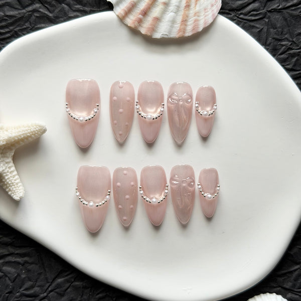blush nude press on nails almond shape pearl detail minimalist luxury wedding wear