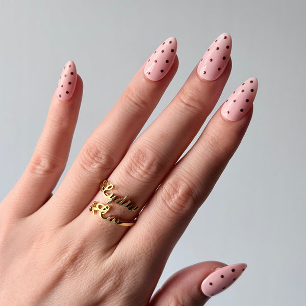 Glossy blush pink press on nails almond shape minimalist polka dot everyday manicure