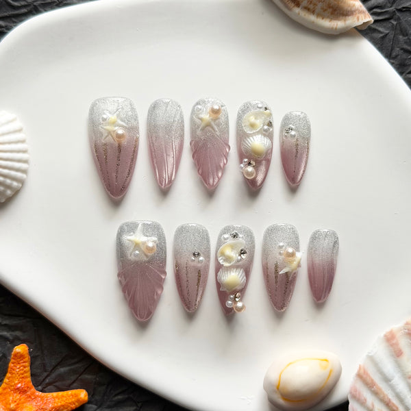 nude pink shimmer press on nails almond shape starfish shell pearl detail summer holiday