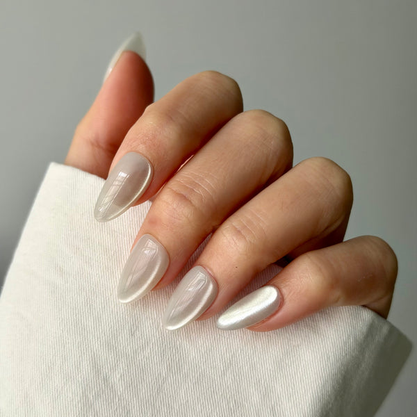 clean white shimmer press on nails almond shape glossy luxury bridal style look