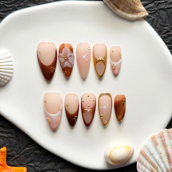 nude brown press on nails almond shape gold chrome accent flower design formal occasion