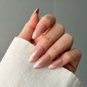 soft nude french tip press on nails almond shape glossy minimalist everyday wear