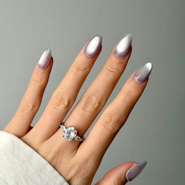 silver pearl press on nails almond shape chrome shimmer elegant evening manicure